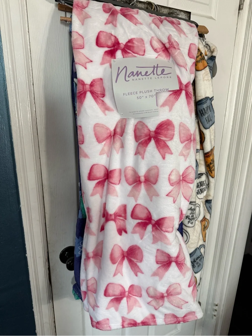 Nanette Lepore Fleece Throw with Pink Bow Print. 50x70